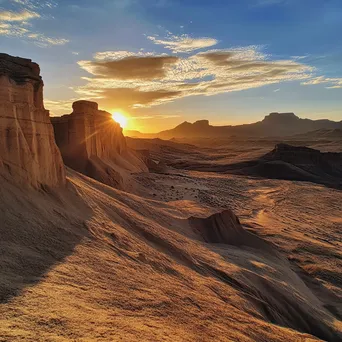 Golden sunset illuminating intricate desert rock formations - Image 3