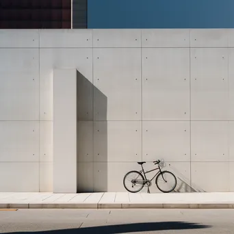 Sleek city bike parked in front of minimalist architecture - Image 2