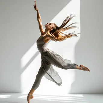 Elegant dancer striking a pose in black and white high contrast - Image 3