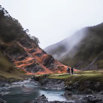 Adventurous visitors relaxing in a misty thermal spring surrounded by rugged terrain. - Image 1