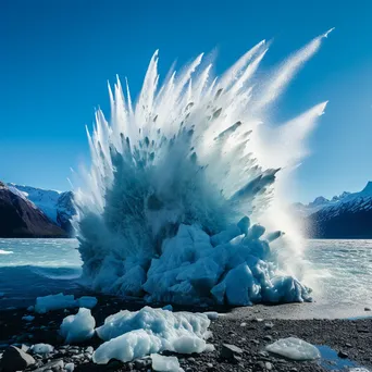 Massive glacier calving into the sea with ice splash - Image 1