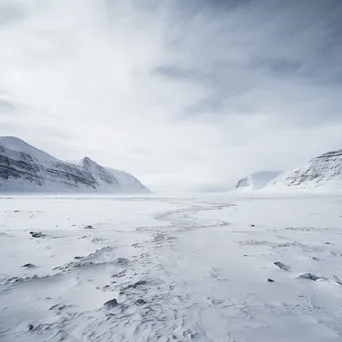 Snow-covered mountain plateau showcasing winter serenity. - Image 4