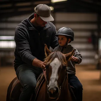 Novice rider learning to saddle a horse with mentor